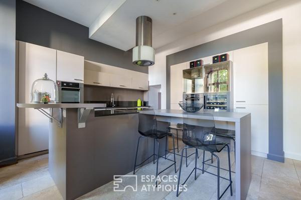 Triplex singulier et ses extérieurs privatifs en coeur de ville