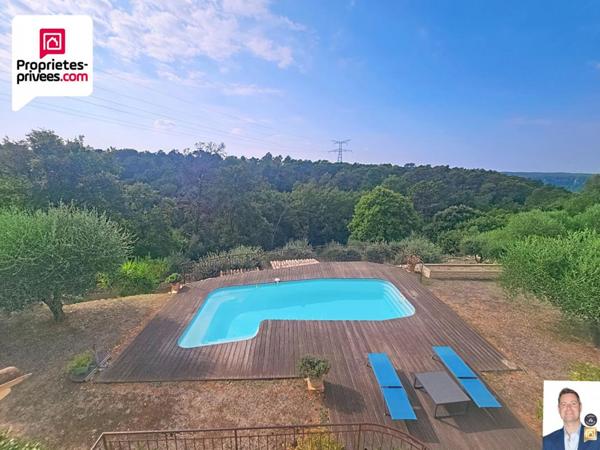 GRANDE VILLA D'ENVIRON 1671M2 AVEC VUE DEGAGEE ET GRAND TERRAIN PAYSAGER DE 5050 M2