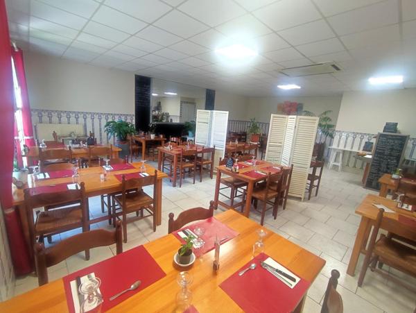 Immeuble avec local commercial et deux appartements