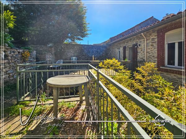 Courniou – Maison de charme 170 m² avec jardin clos, garage et potentiel d’aménagement