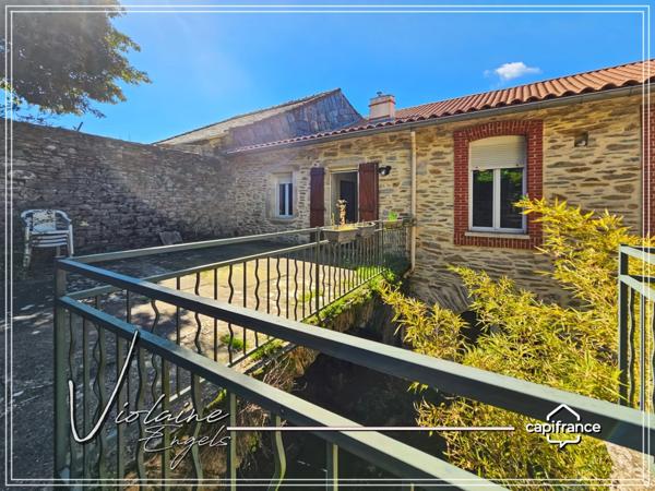 Courniou – Maison de charme 170 m² avec jardin clos, garage et potentiel d’aménagement