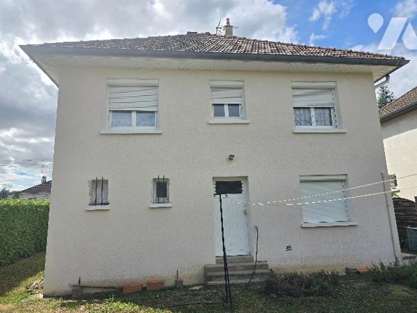 Maison de ville de 91 m² élevée sur sous-sol édifiée sur parcelle de 458 m².