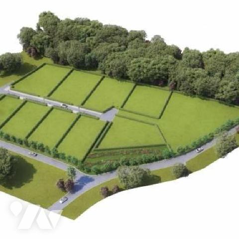 RY, 
Proche du centre bourg, parcelle de terrain à bâtir viabilisée de 1100 m².
Tout à l'égout....