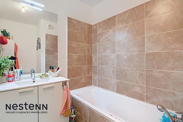 Appartement 2019 T4 80 m² avec balcon + stationnement double en sous-sol