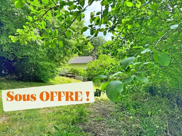 Maison au coeur d'un écrin de verdure