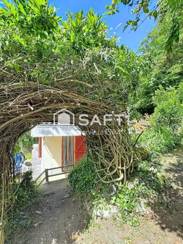 Maison au coeur d'un écrin de verdure