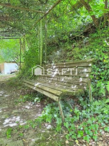 Maison au coeur d'un écrin de verdure