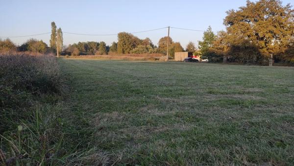 TERRAIN PLAT DE 2408 M² , QUARTIER CALME