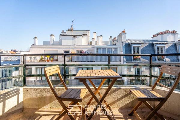 Dernier étage avec ascenseur et balcon