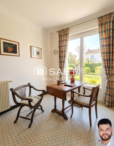 Vaste demeure de 9 pièces avec jardin clos et double balcon en plein cœur de la ville.