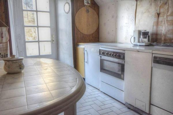 Immeuble d'habitation  et commerce de 177 m2 en centre ville