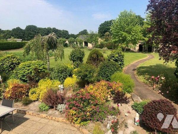 Maison comprenant un sous-sol total composé d'une partie garage, un atelier, une salle d'eau av...