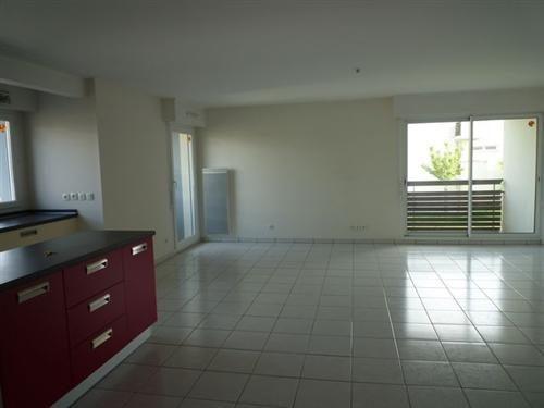 Appartement type 4 avec garage, parking et balcons