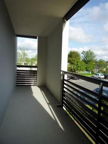Appartement type 4 avec garage, parking et balcons