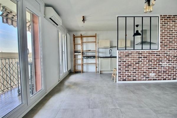 Appartement de type 3 d'environ 65m² avec balcon et place privative