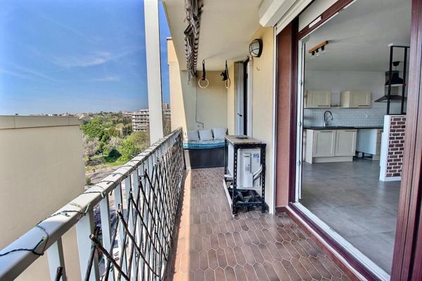 Appartement de type 3 d'environ 65m² avec balcon et place privative