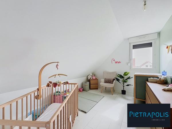 Maison Mitoyenne par le garage