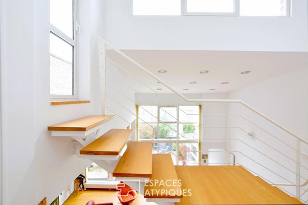Loft d’architecte en triplex au coeur d’une ancienne filature