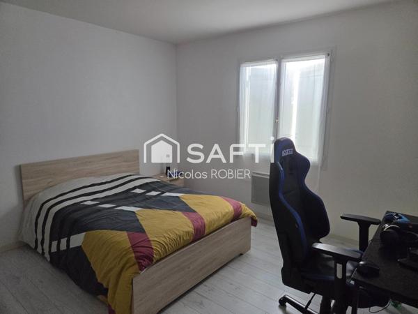 Plain pied trois chambres et un bureau, garage attenant, jardin !