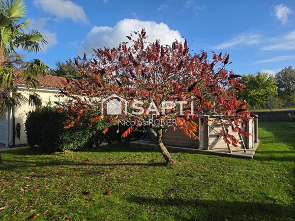 Plain pied trois chambres et un bureau, garage attenant, jardin !