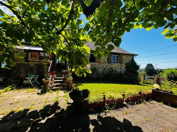 MAISON EN PIERRE A VENDRE LAGRAULIERE PLUS D'1 HECTARE DE TERRAIN