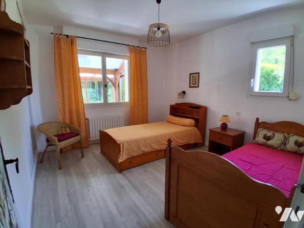 MAISON 4 CHAMBRES sur parc arboré