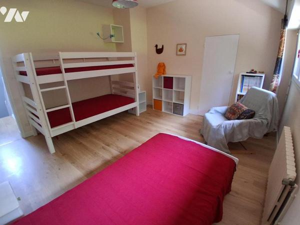 MAISON 4 CHAMBRES sur parc arboré