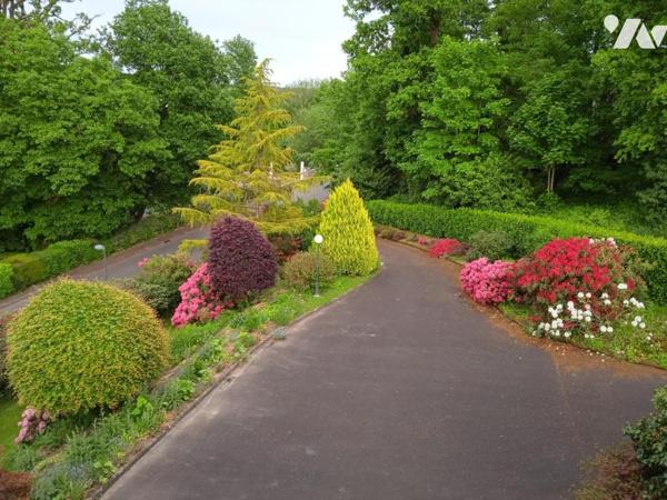 MAISON 4 CHAMBRES sur parc arboré