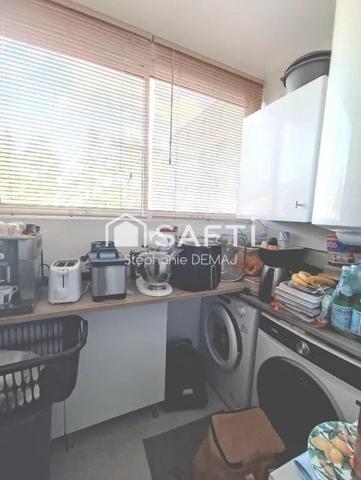 APPARTEMENT AVEC BALCON -CAVE ET PARKING