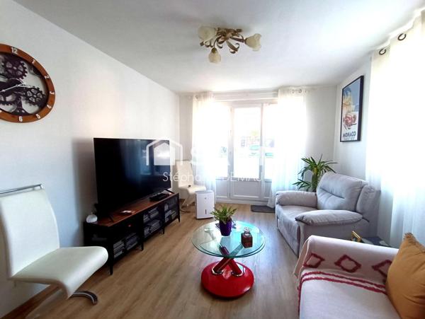 APPARTEMENT AVEC BALCON -CAVE ET PARKING