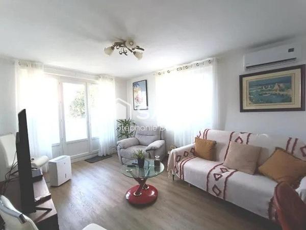 APPARTEMENT AVEC BALCON -CAVE ET PARKING