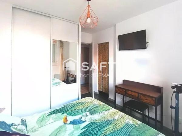 APPARTEMENT AVEC BALCON -CAVE ET PARKING