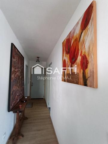 APPARTEMENT AVEC BALCON -CAVE ET PARKING