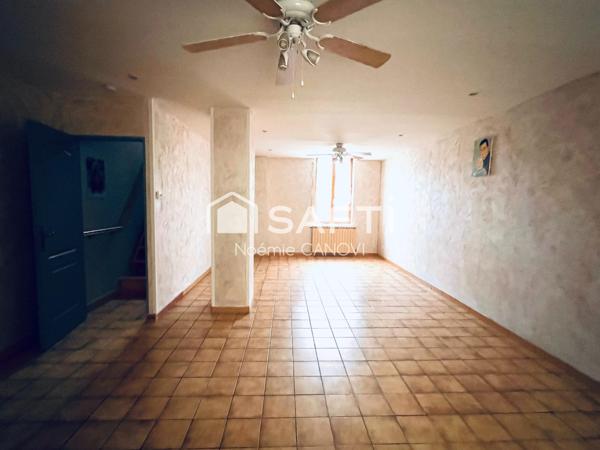 Maison familiale spacieuse avec garages à potentiel locatif – À visiter sans tarder !