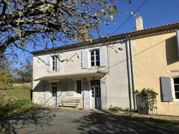 Maison de campagne avec un grand potentiel dans un hameau tranquille