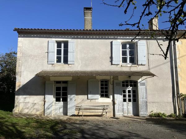 Maison de campagne avec un grand potentiel dans un hameau tranquille