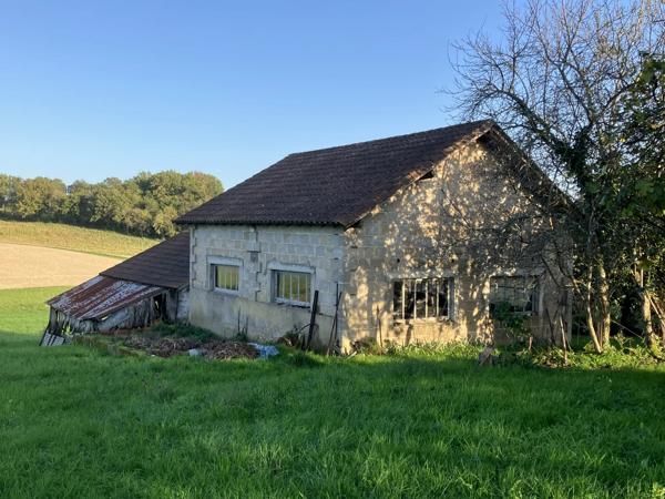 Maison de campagne avec un grand potentiel dans un hameau tranquille