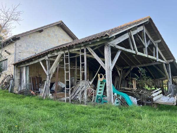 Maison de campagne avec un grand potentiel dans un hameau tranquille
