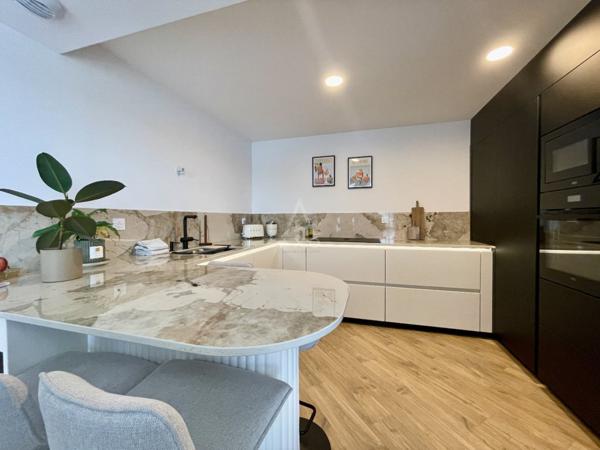 A vendre -appartement T4 surface de 97,33 m2 avec 3 chambres et 2 balcons, immeuble récent, situé à Rennes et proche St Grégoire