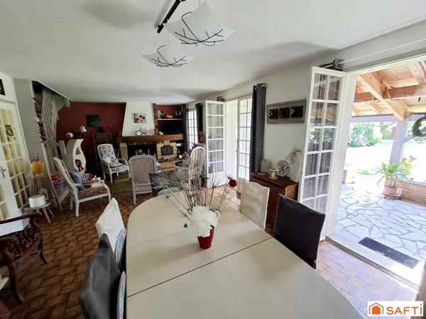 Maison 6 pièces 107m2, 3 chambres, garage et parc paysager