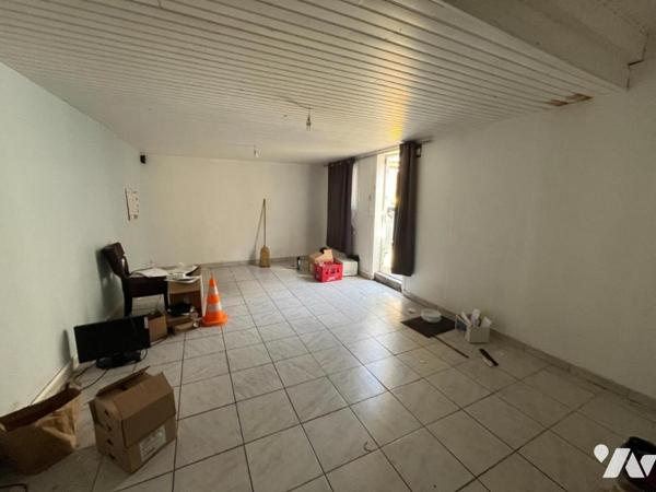 Local professionnel Bar-Tabac et appartement attenant