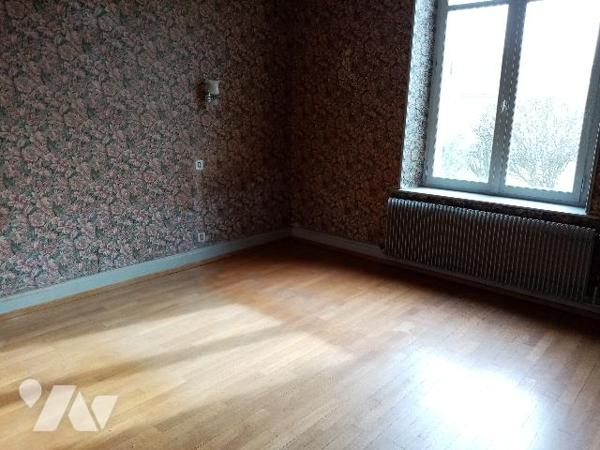 secteur Gohypré , zone d'habitation calme proche écoles, maison mitoyenne 1 côté terrain de 729 m²