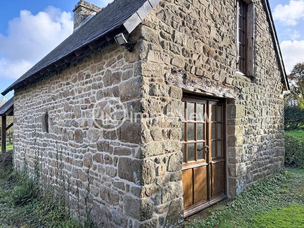 Maison en pierres avec dépendances sur un terrain de 1751 m²