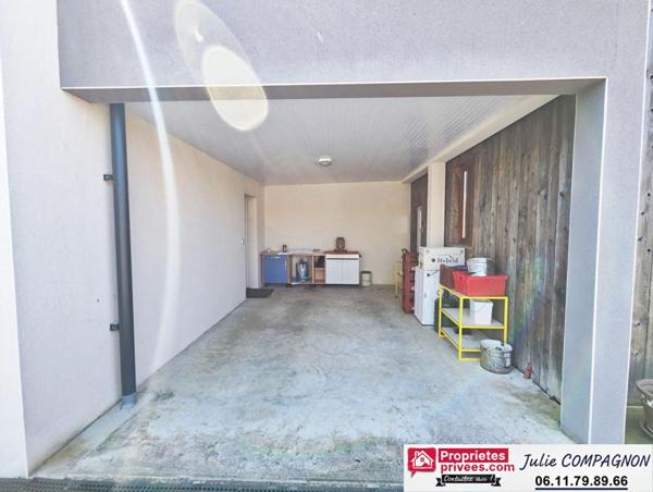 Maison 100 m² avec 2 chambres , 2 garages, grand carport et jardin