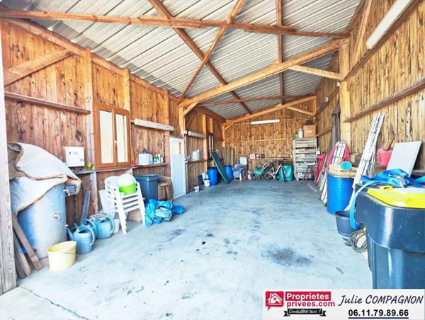 Maison 100 m² avec 2 chambres , 2 garages, grand carport et jardin