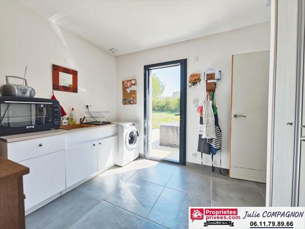 Maison 100 m² avec 2 chambres , 2 garages, grand carport et jardin