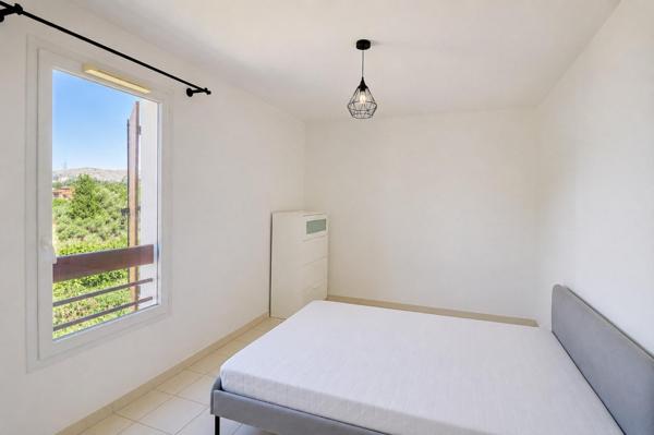 T3 61 m² – 2 chambres – Balcon – Vue dégagée – Sainte-Marthe