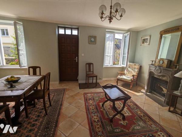 TOURLAVILLE - MAISON EN PIERRE ET JARDIN