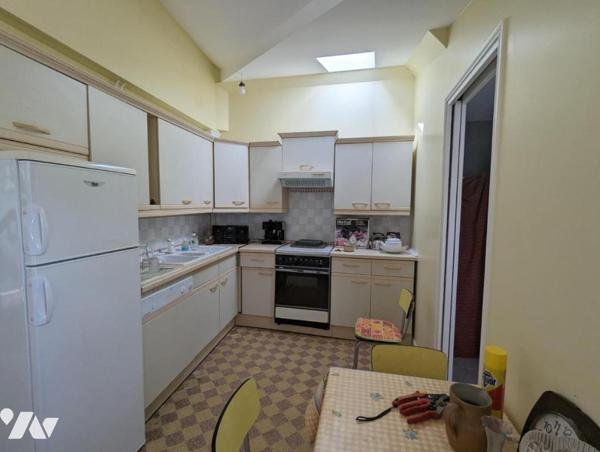 TOURLAVILLE - MAISON EN PIERRE ET JARDIN