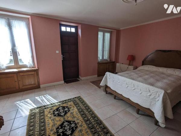 TOURLAVILLE - MAISON EN PIERRE ET JARDIN